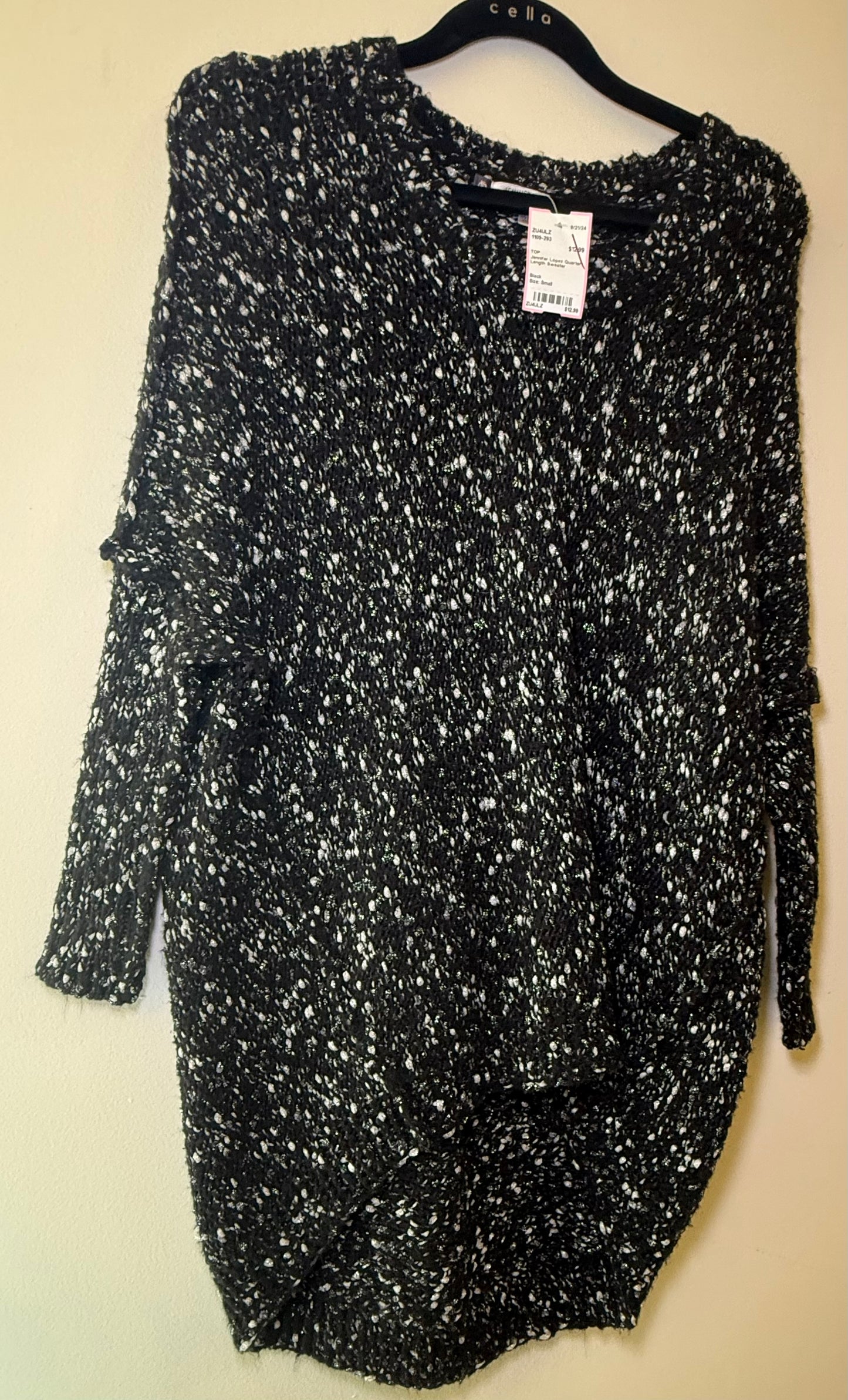 Jennifer Lopez quarter length sweater